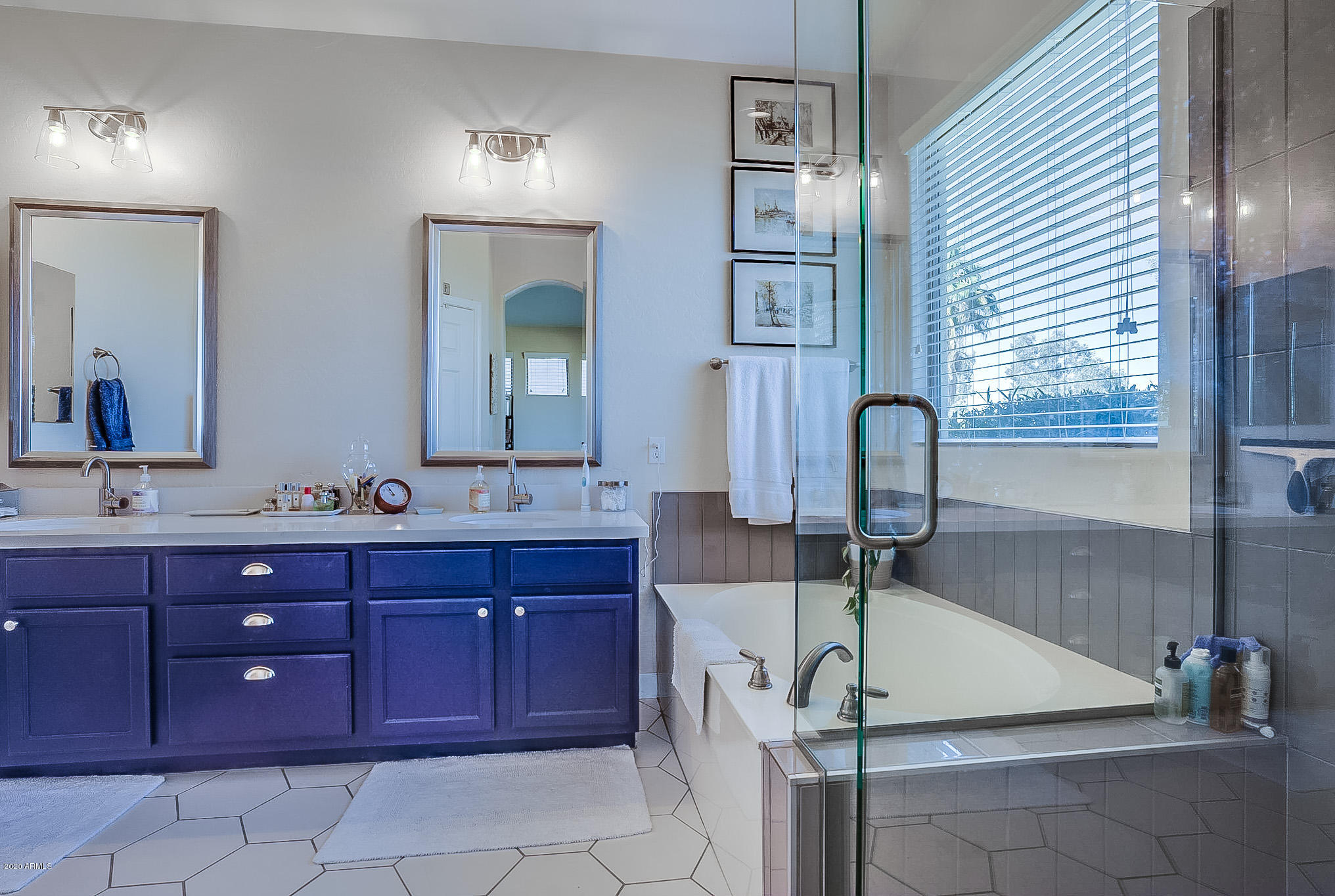 2520 East Fremont Road Phoenix, AZ 85042 - Photo 36 of 62 a bathroom with a sink and a mirror