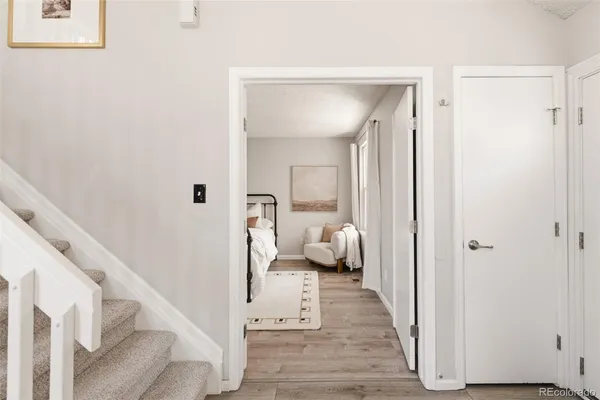 a view of a bedroom from the hallway