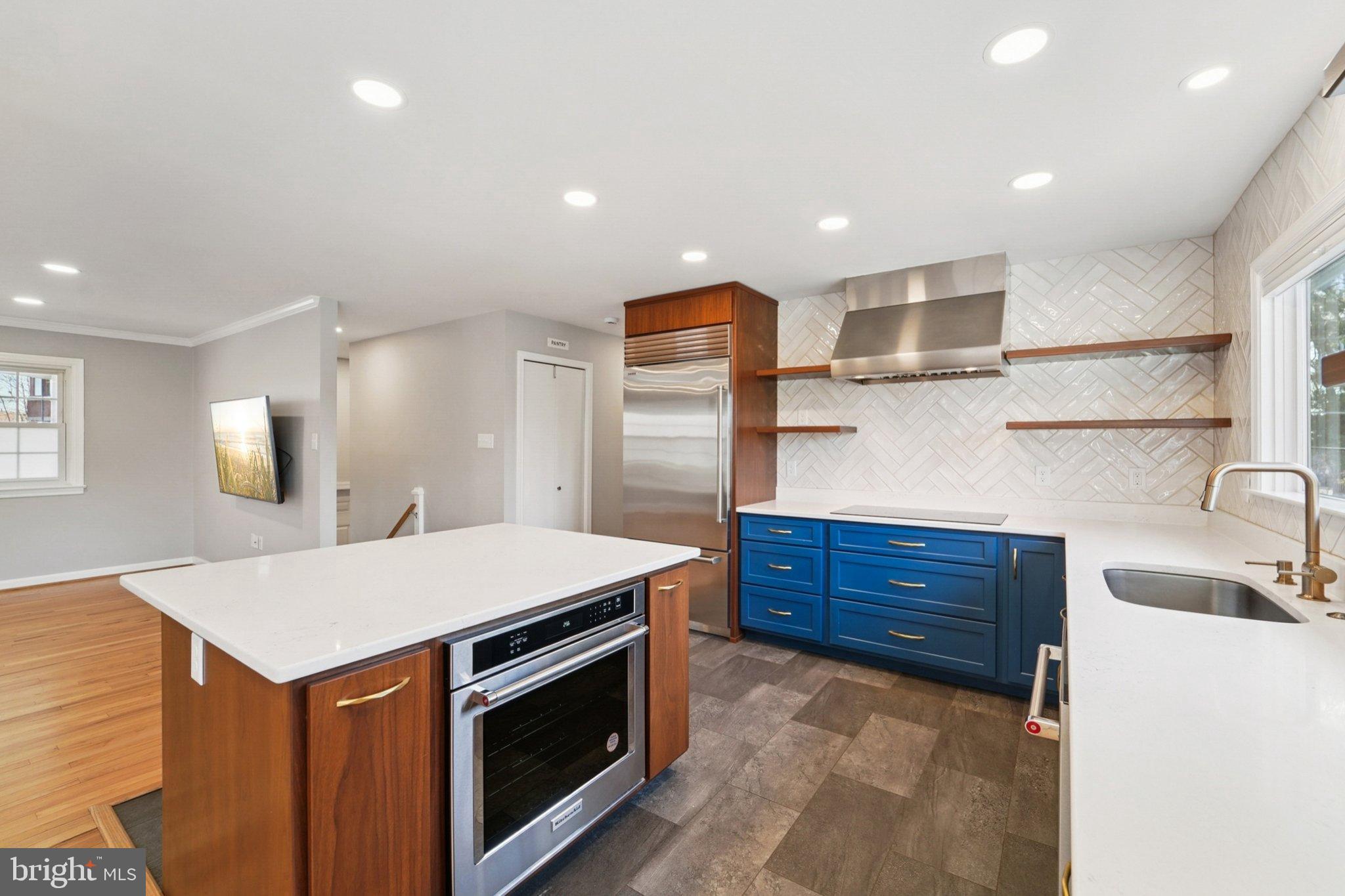 5 North Jefferson Street Frederick, MD 21701 - Photo 14 of 50 Modern kitchen with sleek design elements.