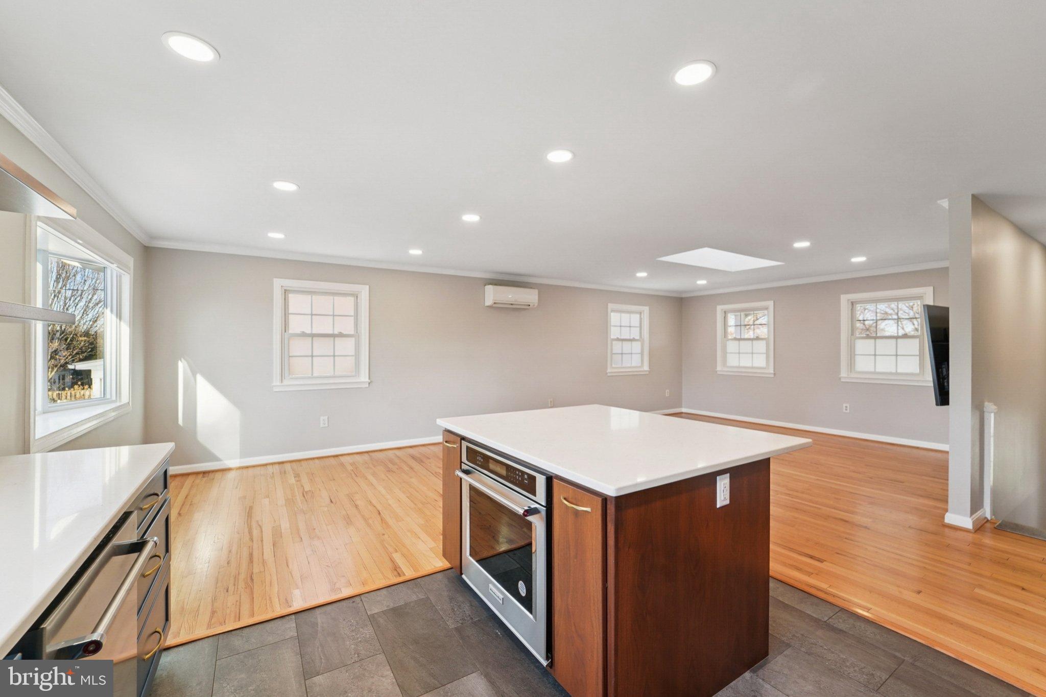 5 North Jefferson Street Frederick, MD 21701 - Photo 15 of 50 Spacious, sunlit kitchen with modern finishes.