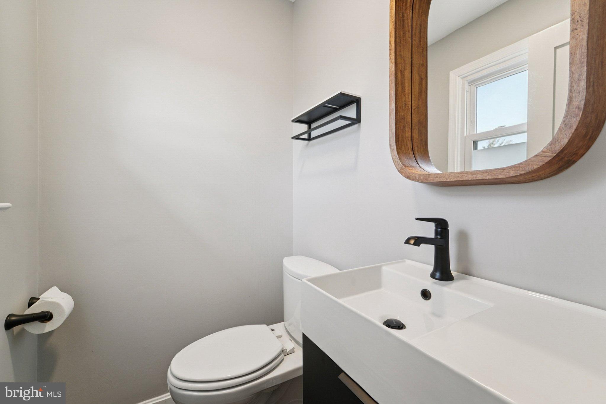 5 North Jefferson Street Frederick, MD 21701 - Photo 23 of 50 Sleek modern bathroom with elegant finishes.