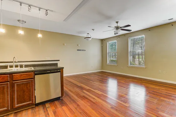 a view of a livingroom with wooden floor