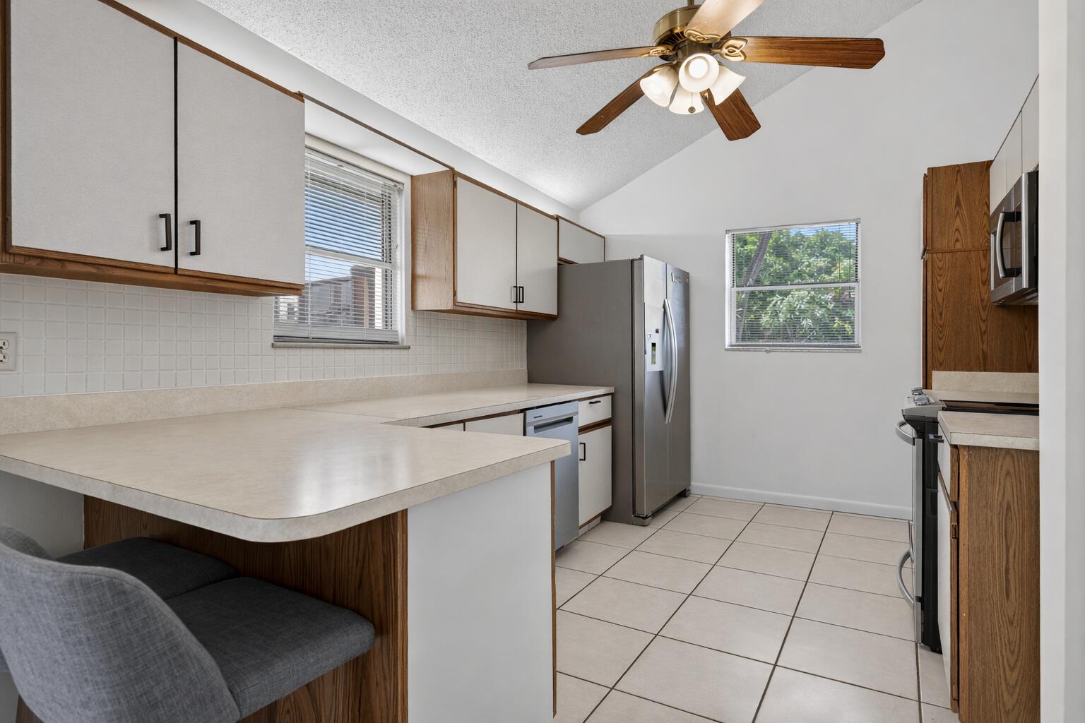 102 Maplecrest Circle Jupiter, FL 33458 - Photo 8 of 39 open kitchen