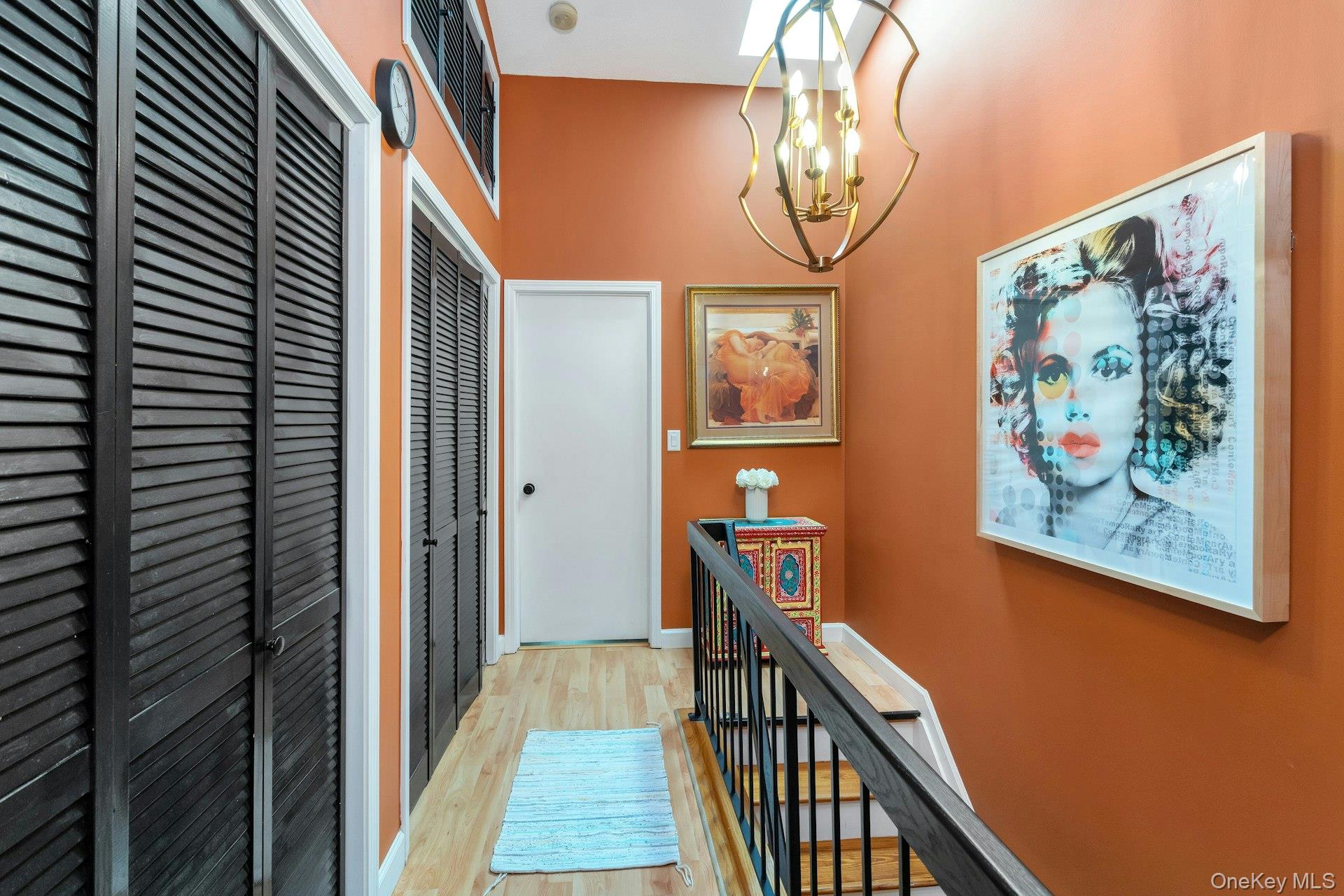 53 Villa Drive Peekskill, NY 10566 - Photo 14 of 26 a view of a hallway with paintings on the wall