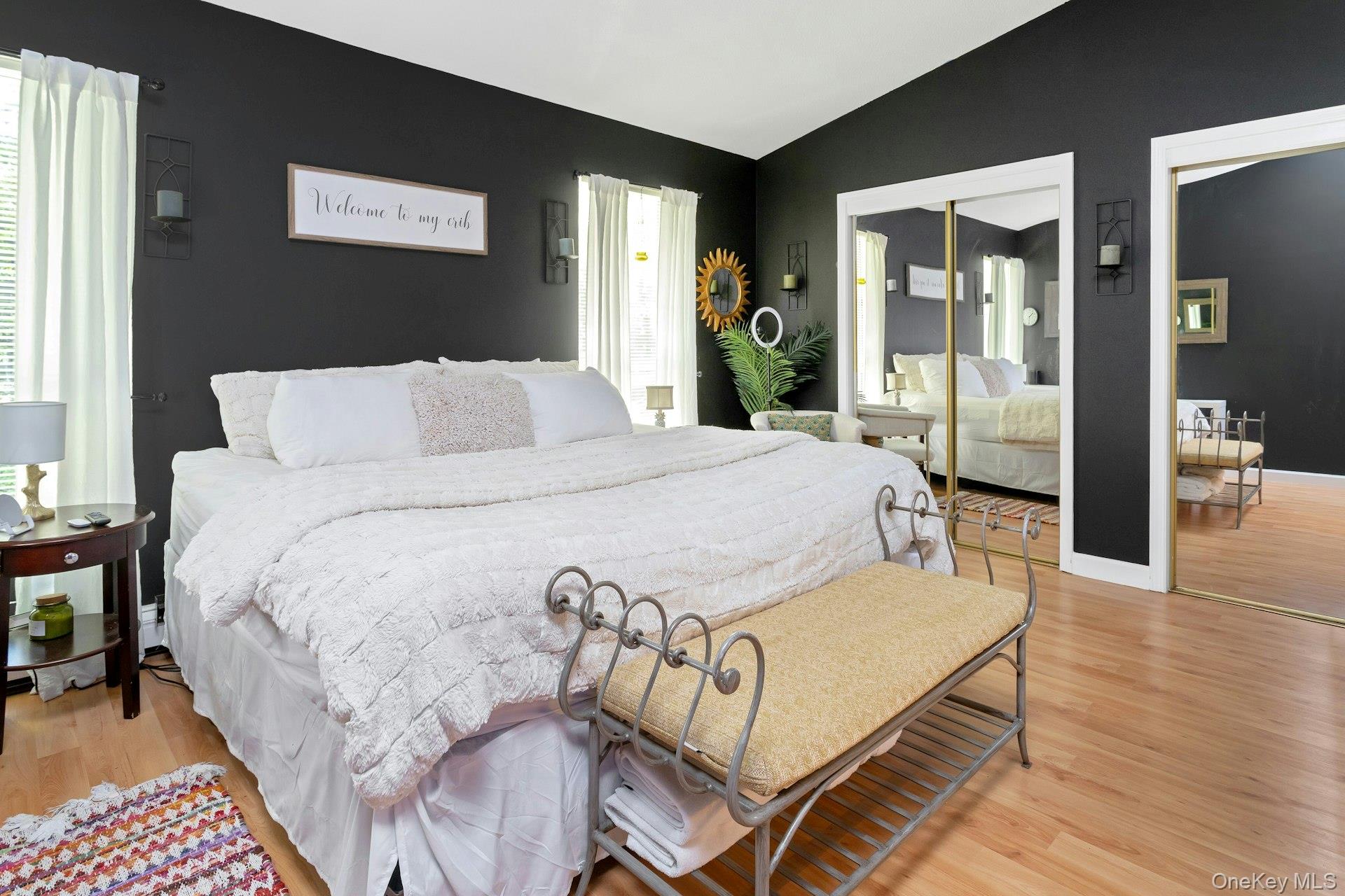 53 Villa Drive Peekskill, NY 10566 - Photo 16 of 26 a bedroom with a bed and wooden floor