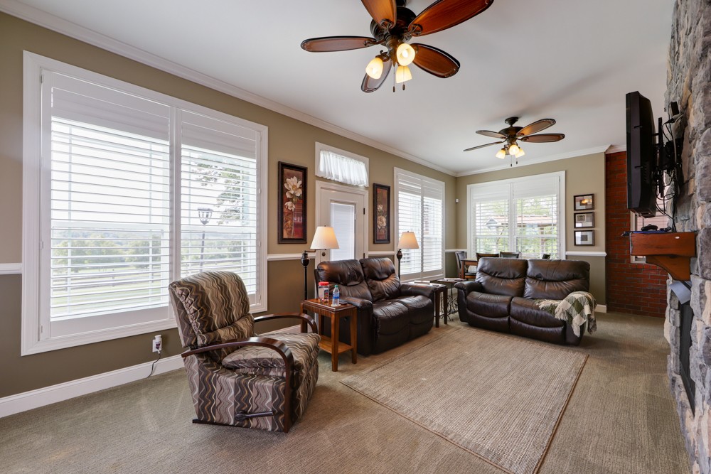 758 Sugar Flat Road Lebanon, TN 37087 - Photo 20 of 44 a living room with furniture ceiling fan and a window