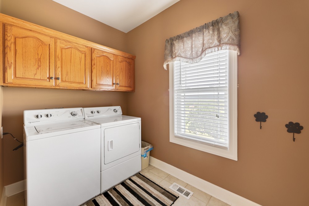 758 Sugar Flat Road Lebanon, TN 37087 - Photo 24 of 44 a utility room with dryer and washer