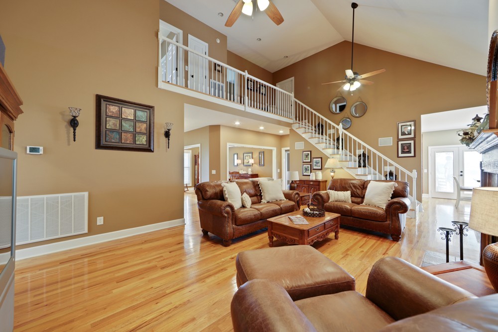 758 Sugar Flat Road Lebanon, TN 37087 - Photo 9 of 44 a living room with furniture and a chandelier