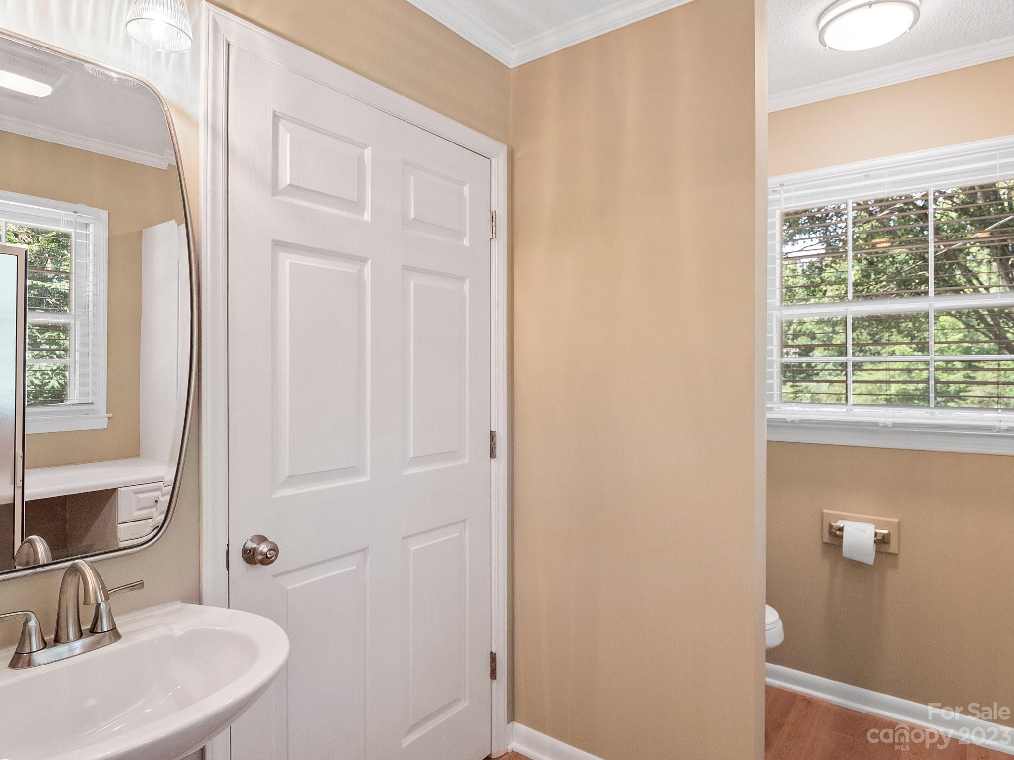 807 Red Cedar Lane Monroe, NC 28110 - Photo 26 of 34 a bathroom with a sink and a mirror