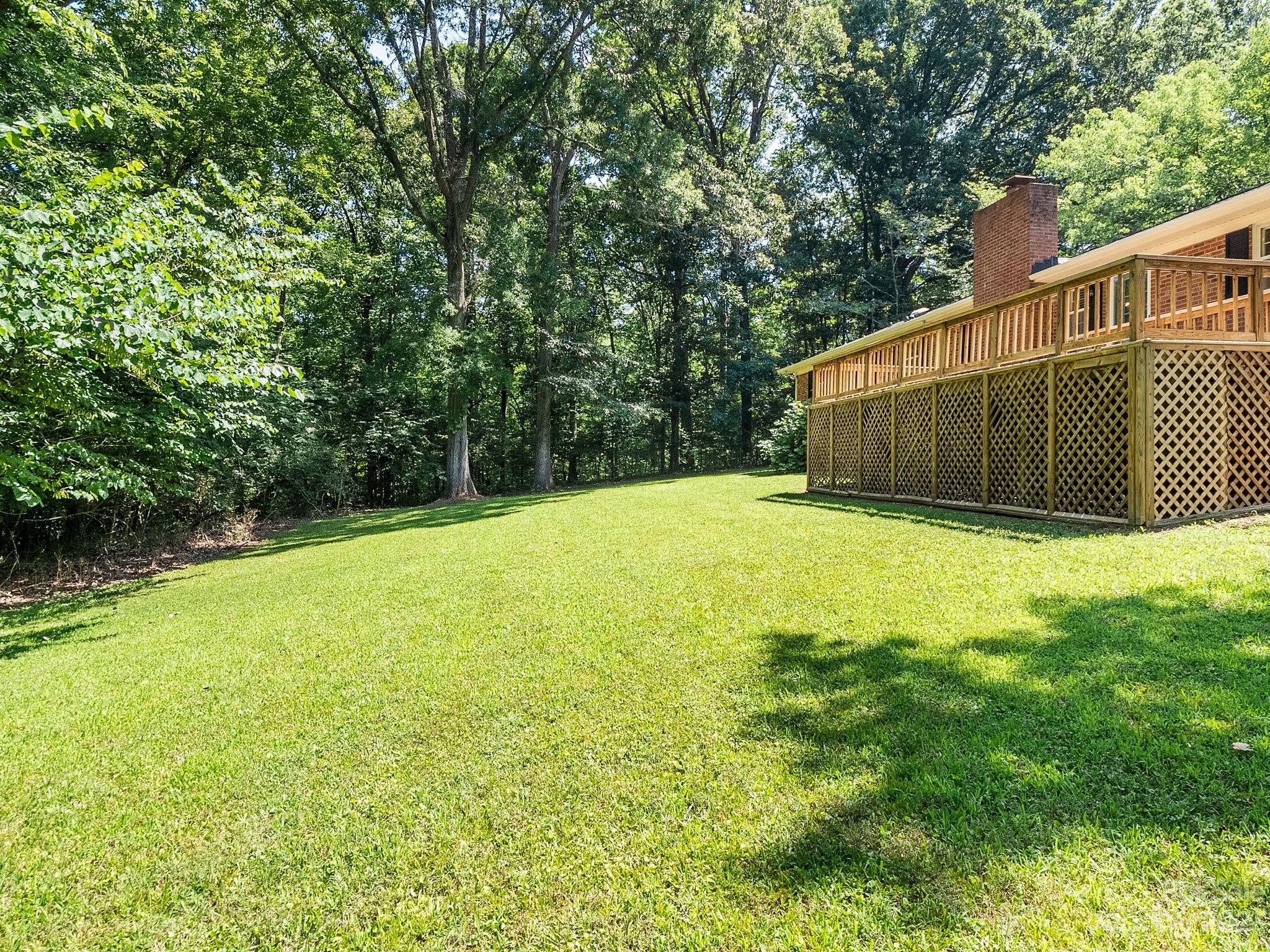 807 Red Cedar Lane Monroe, NC 28110 - Photo 32 of 34 a view of an outdoor space and a yard