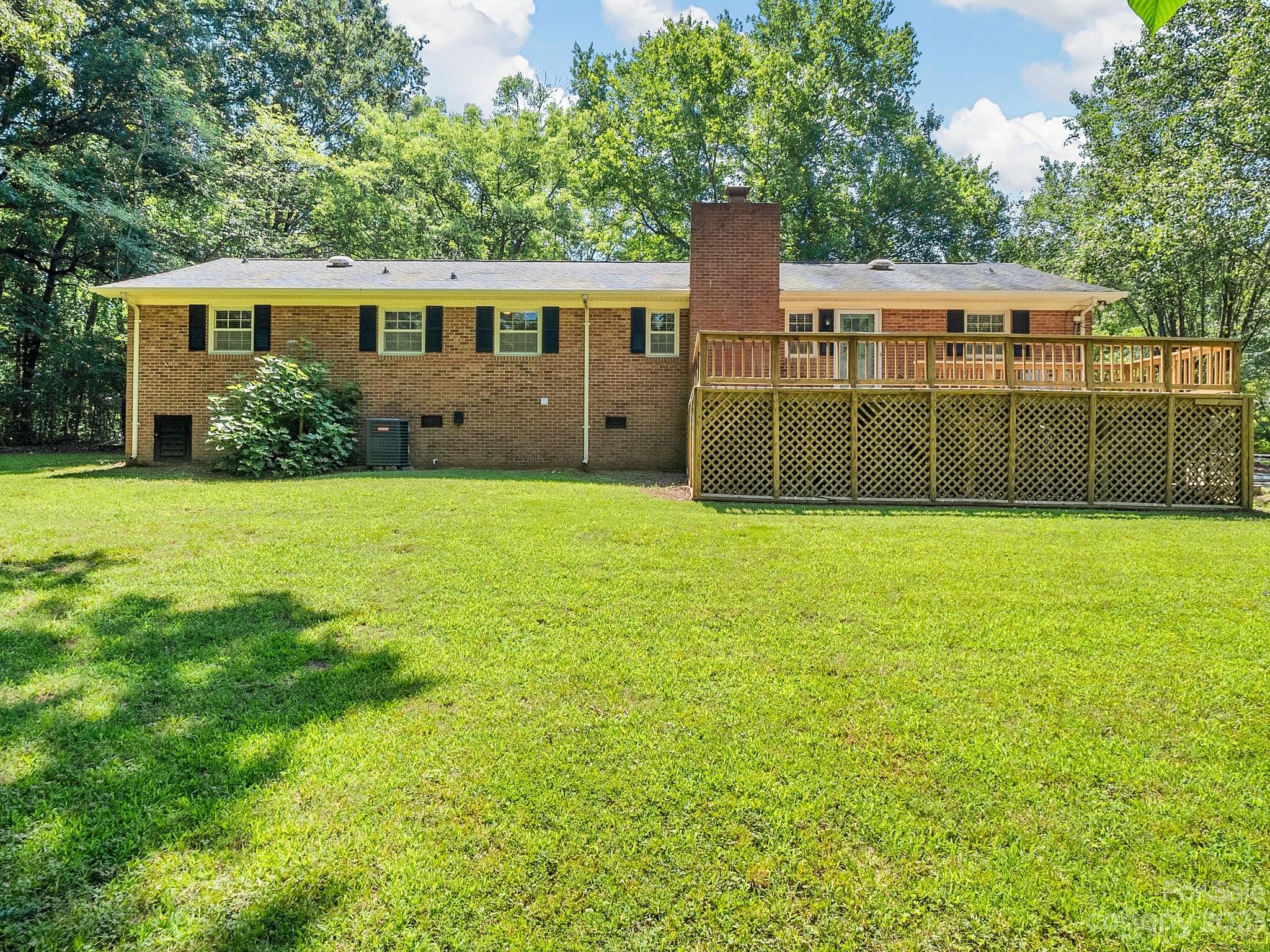 807 Red Cedar Lane Monroe, NC 28110 - Photo 33 of 34 a view of a house with a backyard