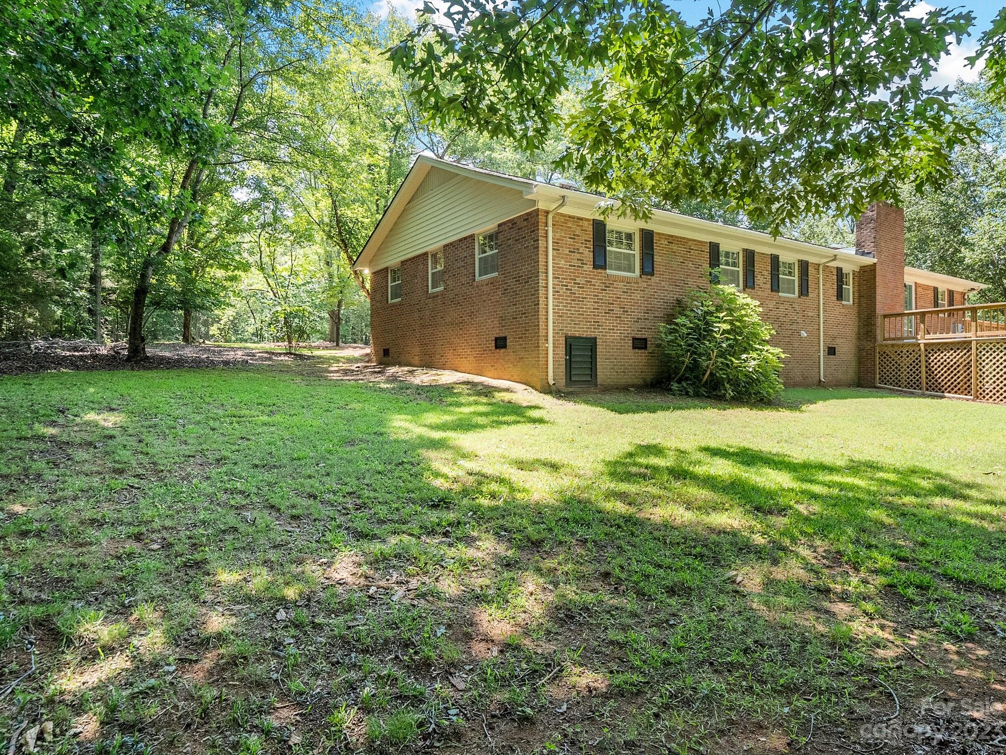 807 Red Cedar Lane Monroe, NC 28110 - Photo 34 of 34 a view of a house with a yard