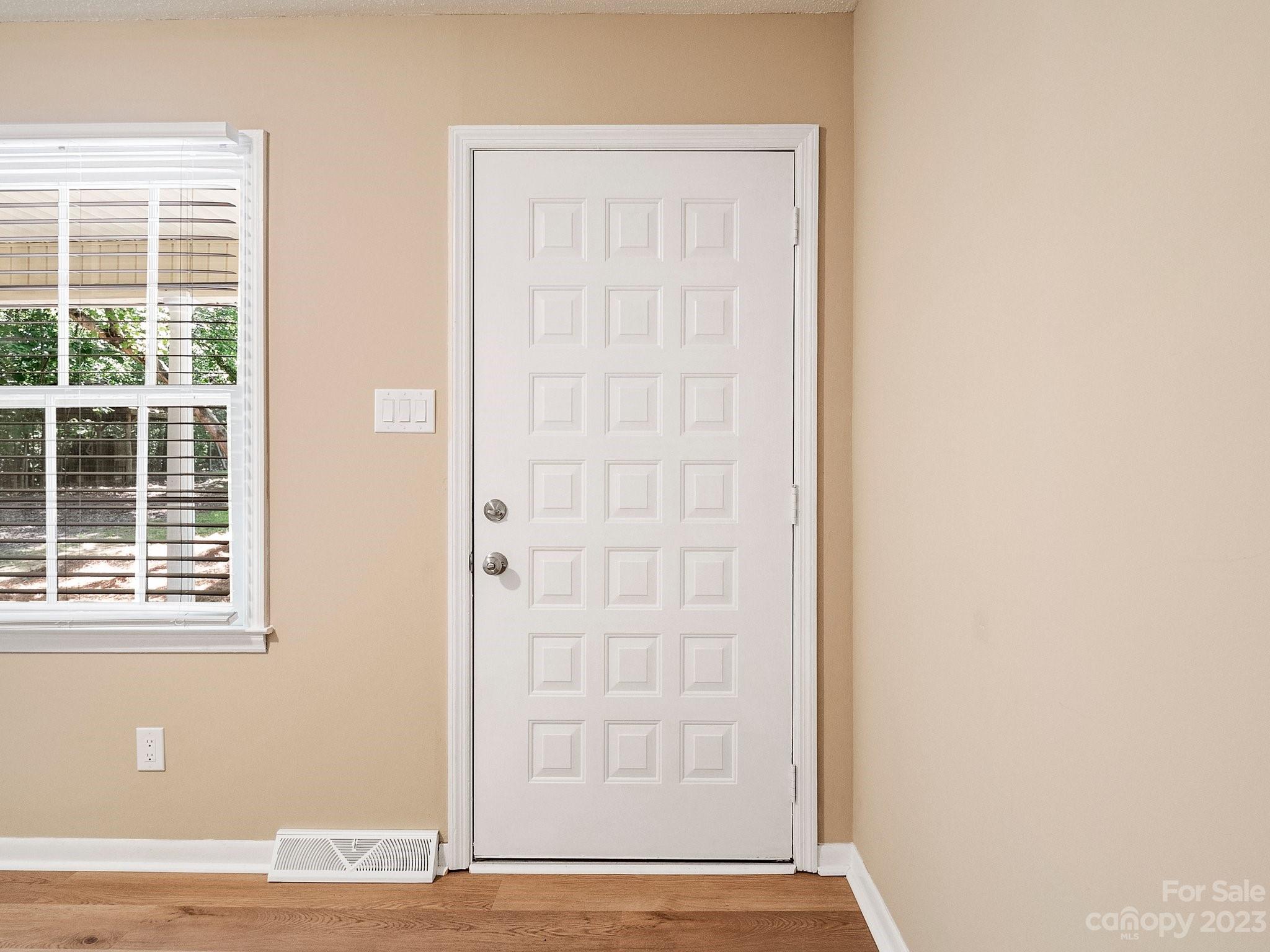 807 Red Cedar Lane Monroe, NC 28110 - Photo 7 of 34 a view of front door with wooden floor