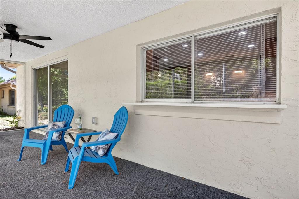 12415 Stagecoach Lane Hudson, FL 34667 - Photo 34 of 51 a view of a room that has a table and chairs