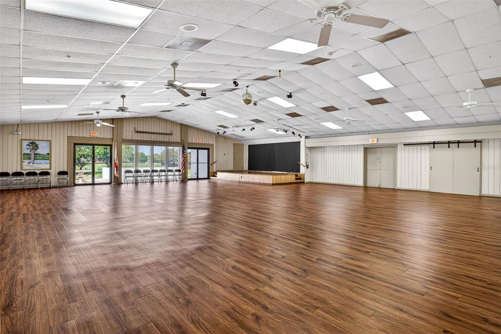 12415 Stagecoach Lane Hudson, FL 34667 - Photo 39 of 51 a view of a room with lots of wooden floor
