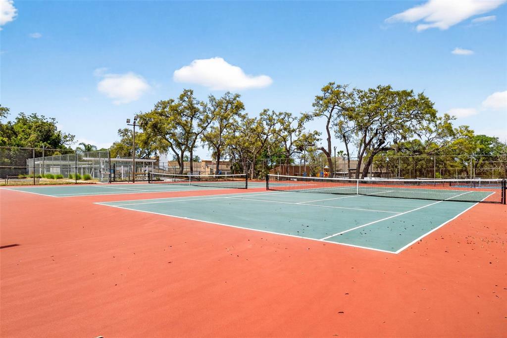 12415 Stagecoach Lane Hudson, FL 34667 - Photo 48 of 51 a view of a tennis court