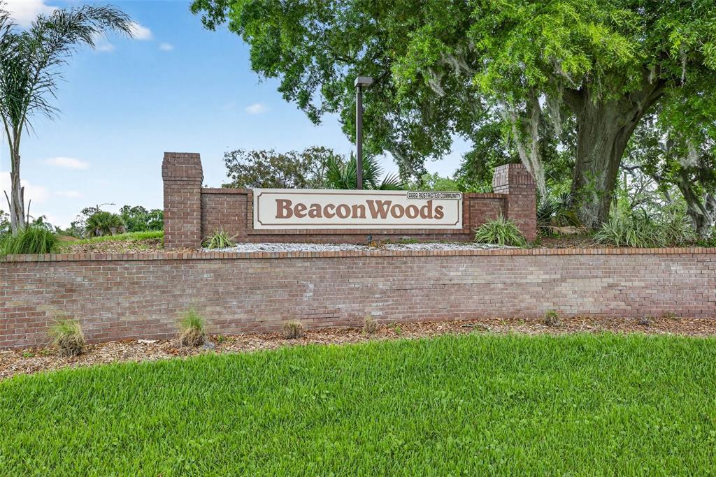 12415 Stagecoach Lane Hudson, FL 34667 - Photo 50 of 51 a sign that is on the side of the tree