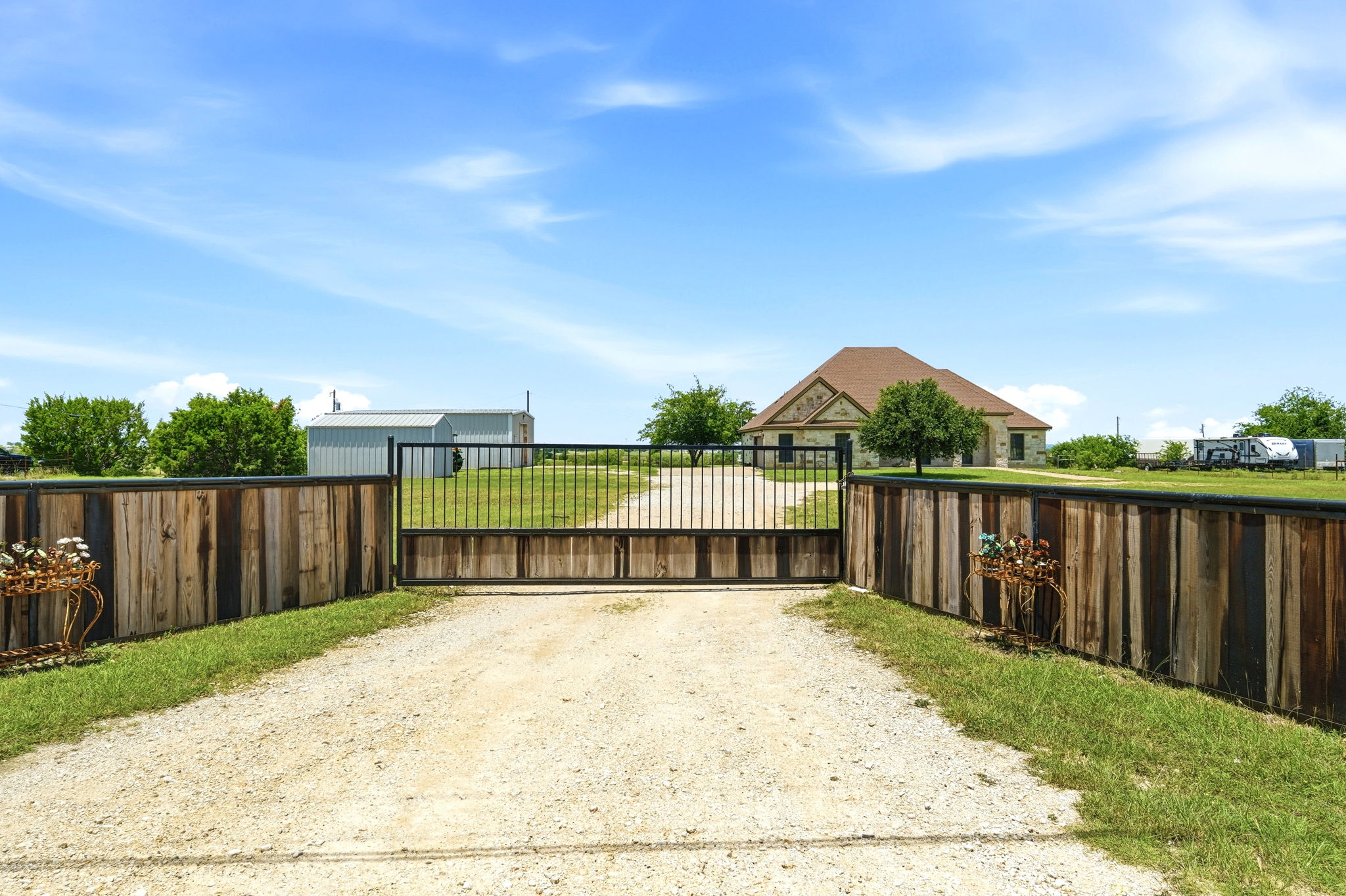 701 County Road 107 Georgetown, TX 78626 - Photo 2 of 30 a view of swimming pool with wooden fence