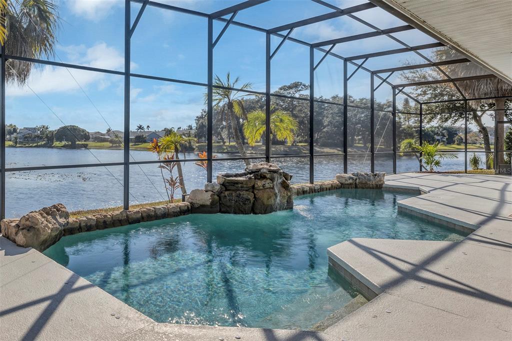 3728 Hunter's Isle Drive Orlando, FL 32837 - Photo 11 of 74 a view of a living room and floor to ceiling window