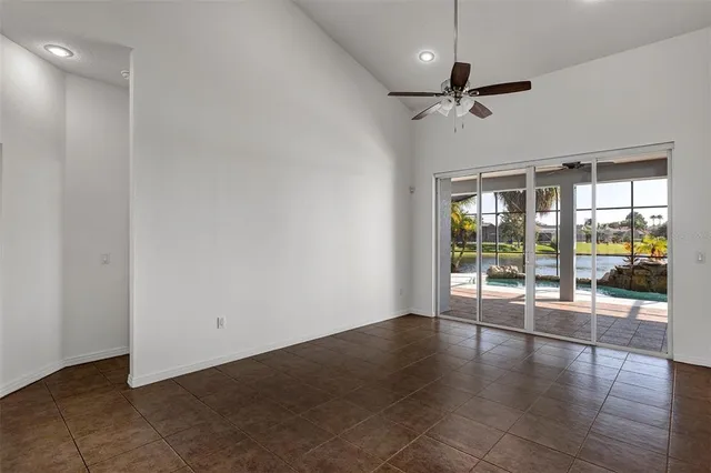 a kitchen with granite countertop a sink stainless steel appliances and cabinets