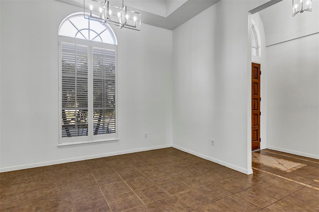 3728 Hunter's Isle Drive Orlando, FL 32837 - Photo 16 of 74 an empty room with a window