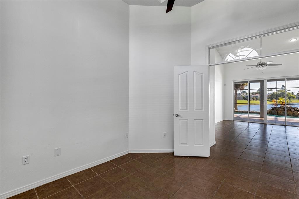 3728 Hunter's Isle Drive Orlando, FL 32837 - Photo 24 of 74 a view of an empty room with glass door