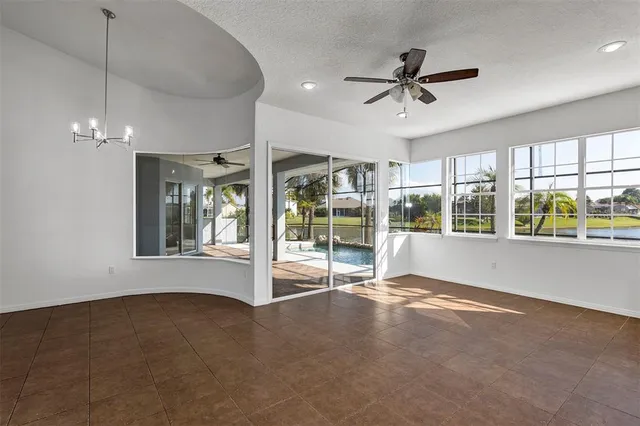 a bathroom with a toilet sink vanity and mirror