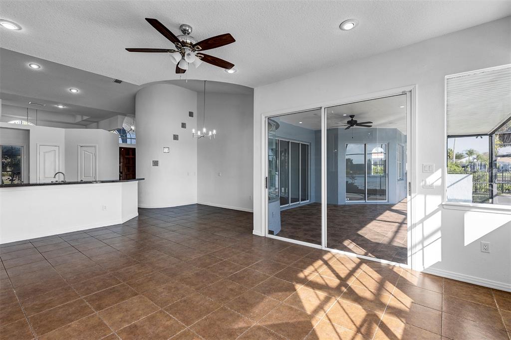 3728 Hunter's Isle Drive Orlando, FL 32837 - Photo 35 of 74 a view of a livingroom with a ceiling fan and window
