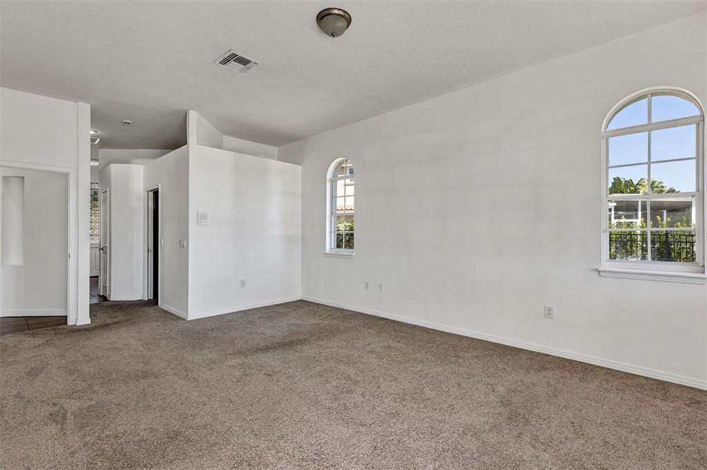3728 Hunter's Isle Drive Orlando, FL 32837 - Photo 39 of 74 a view of an empty room with a window