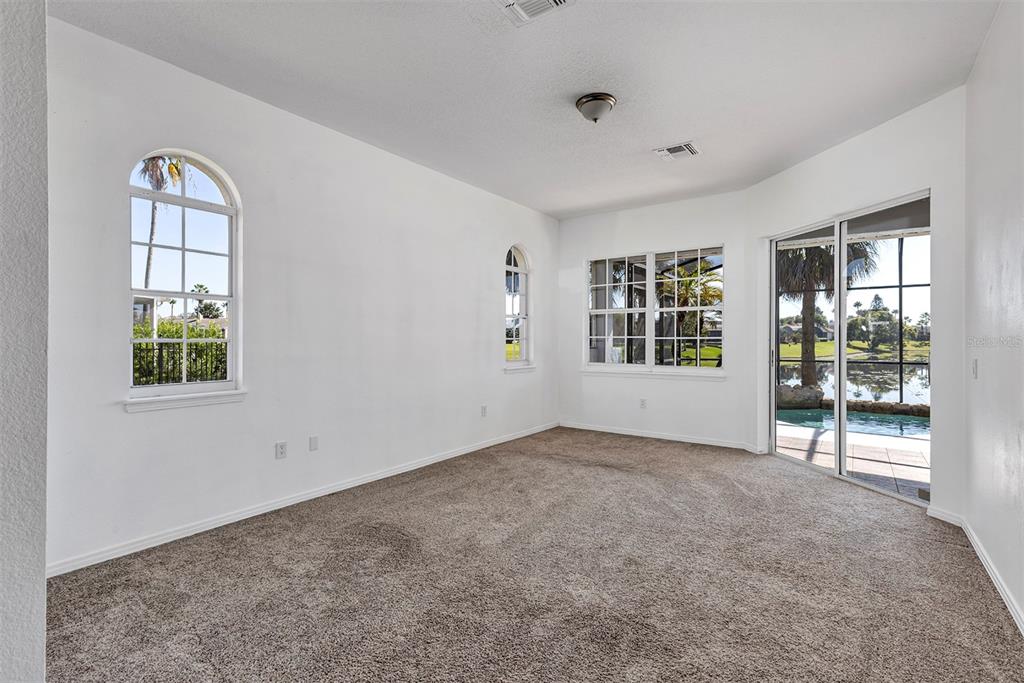 3728 Hunter's Isle Drive Orlando, FL 32837 - Photo 40 of 74 an empty room with windows