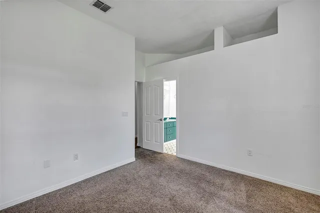 an aerial view of house with yard swimming pool and outdoor seating