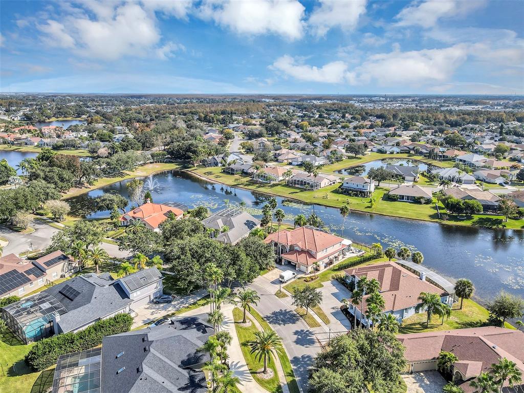 3728 Hunter's Isle Drive Orlando, FL 32837 - Photo 6 of 74 an aerial view of residential houses with outdoor space