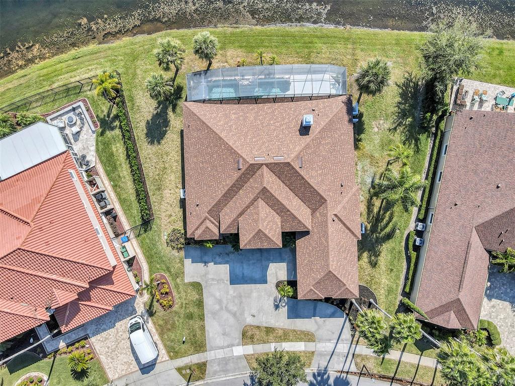 3728 Hunter's Isle Drive Orlando, FL 32837 - Photo 74 of 74 an aerial view of house with yard swimming pool and outdoor seating