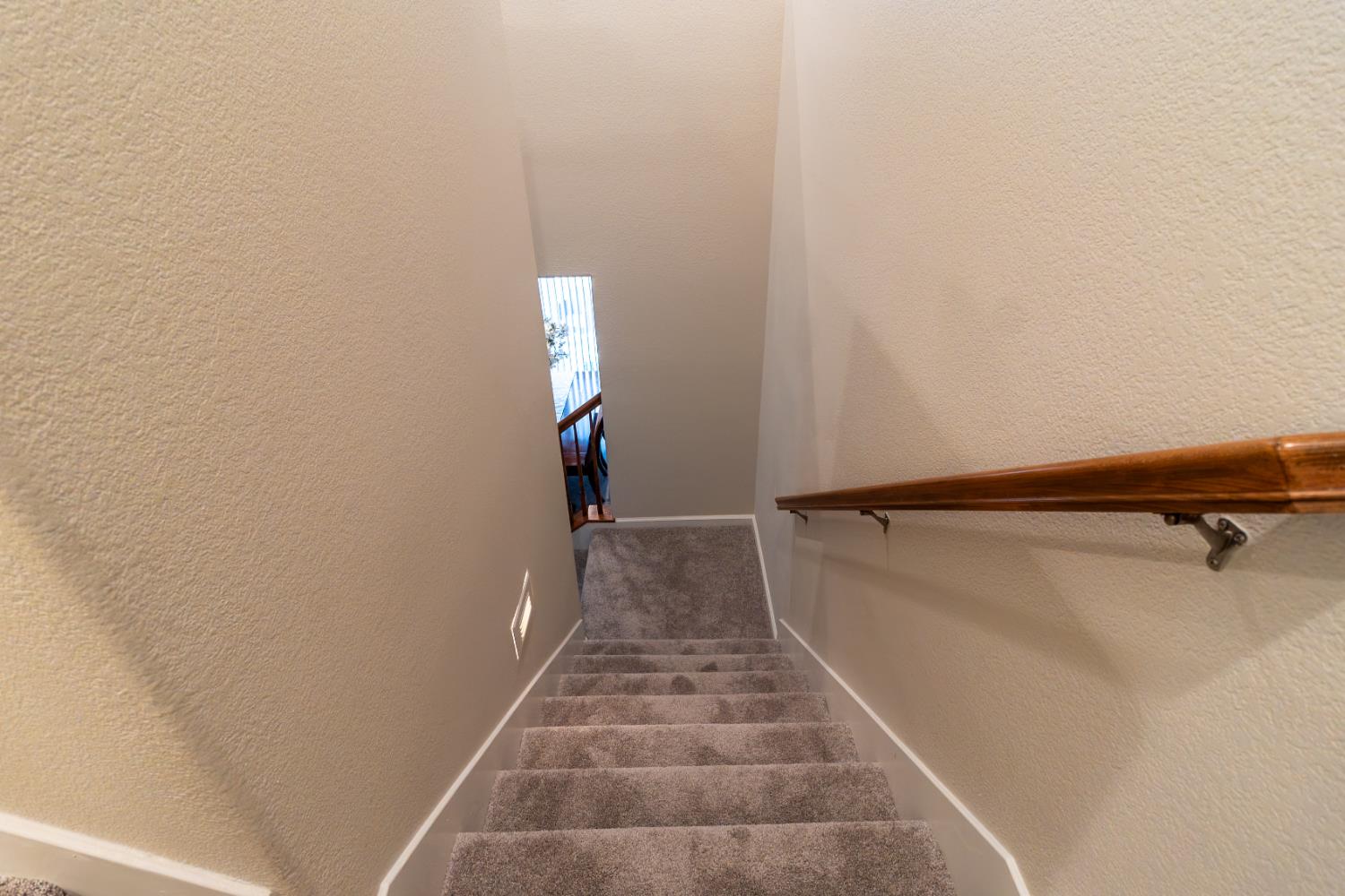 401 Picasso Way Folsom, CA 95630 - Photo 14 of 32 a view of a room with racks on the wall