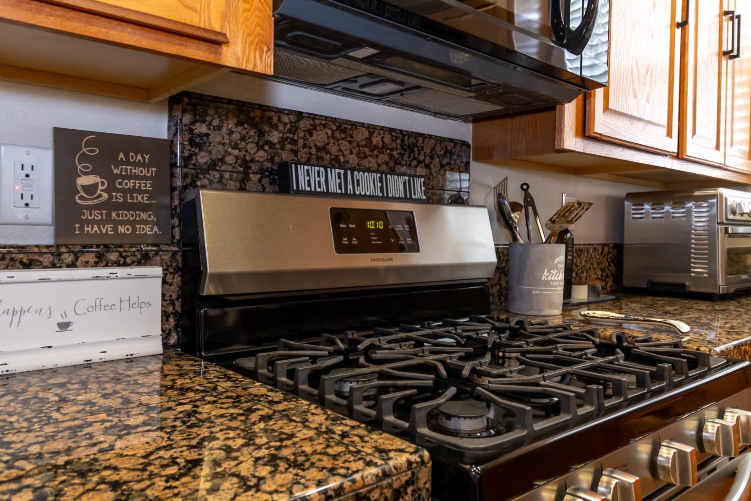 401 Picasso Way Folsom, CA 95630 - Photo 7 of 32 a stove top oven sitting inside of a kitchen
