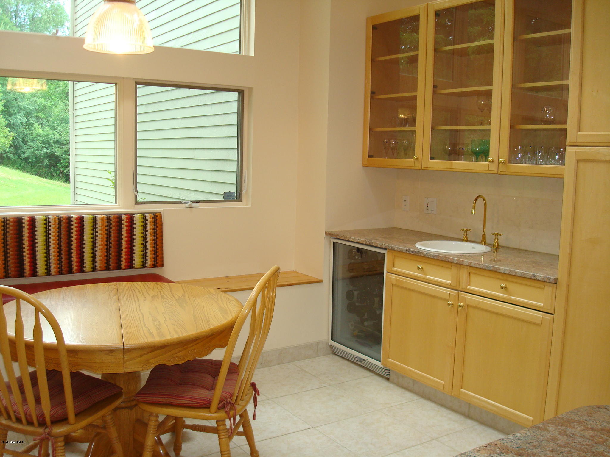 1151 E Road Richmond, MA 01254 - Photo 14 of 33 a view of a dining room with furniture and windows