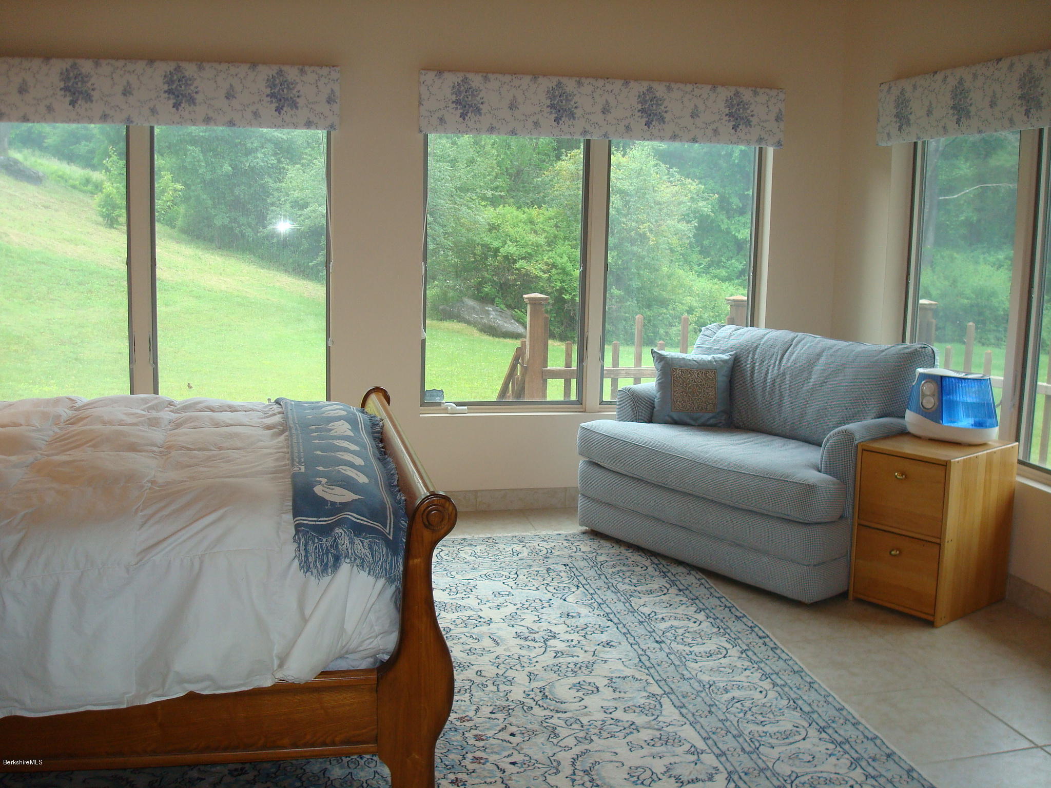1151 E Road Richmond, MA 01254 - Photo 17 of 33 a living room with furniture and a large window