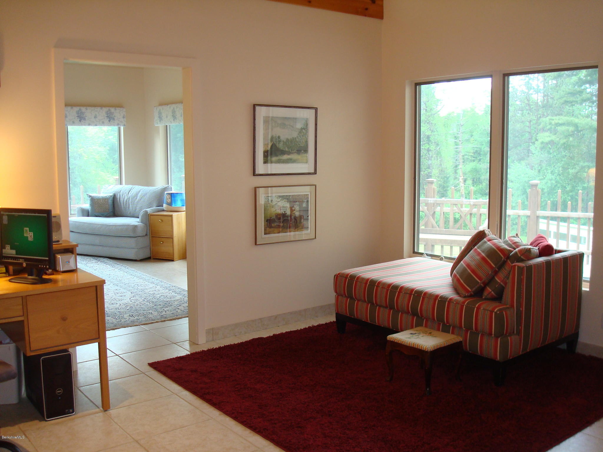 1151 E Road Richmond, MA 01254 - Photo 19 of 33 a living room with furniture wooden floor and a large window