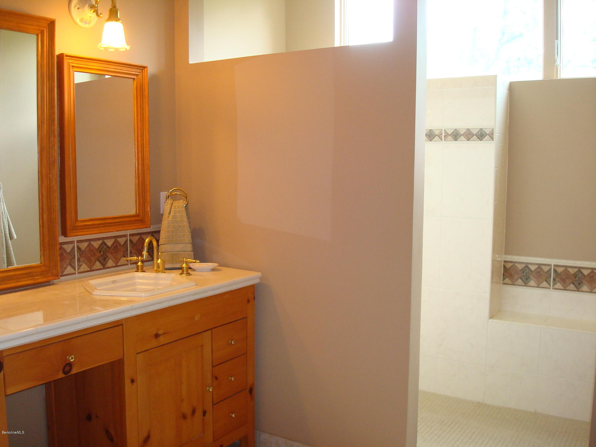 1151 E Road Richmond, MA 01254 - Photo 21 of 33 a bathroom with a sink and a mirror