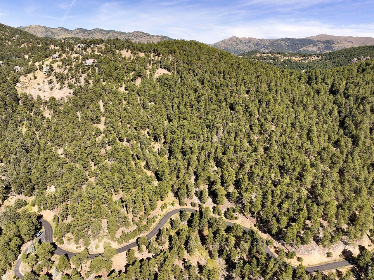 695 Cutter Lane Boulder, CO 80302 - Photo 12 of 20 a view of a mountain with an outdoor space