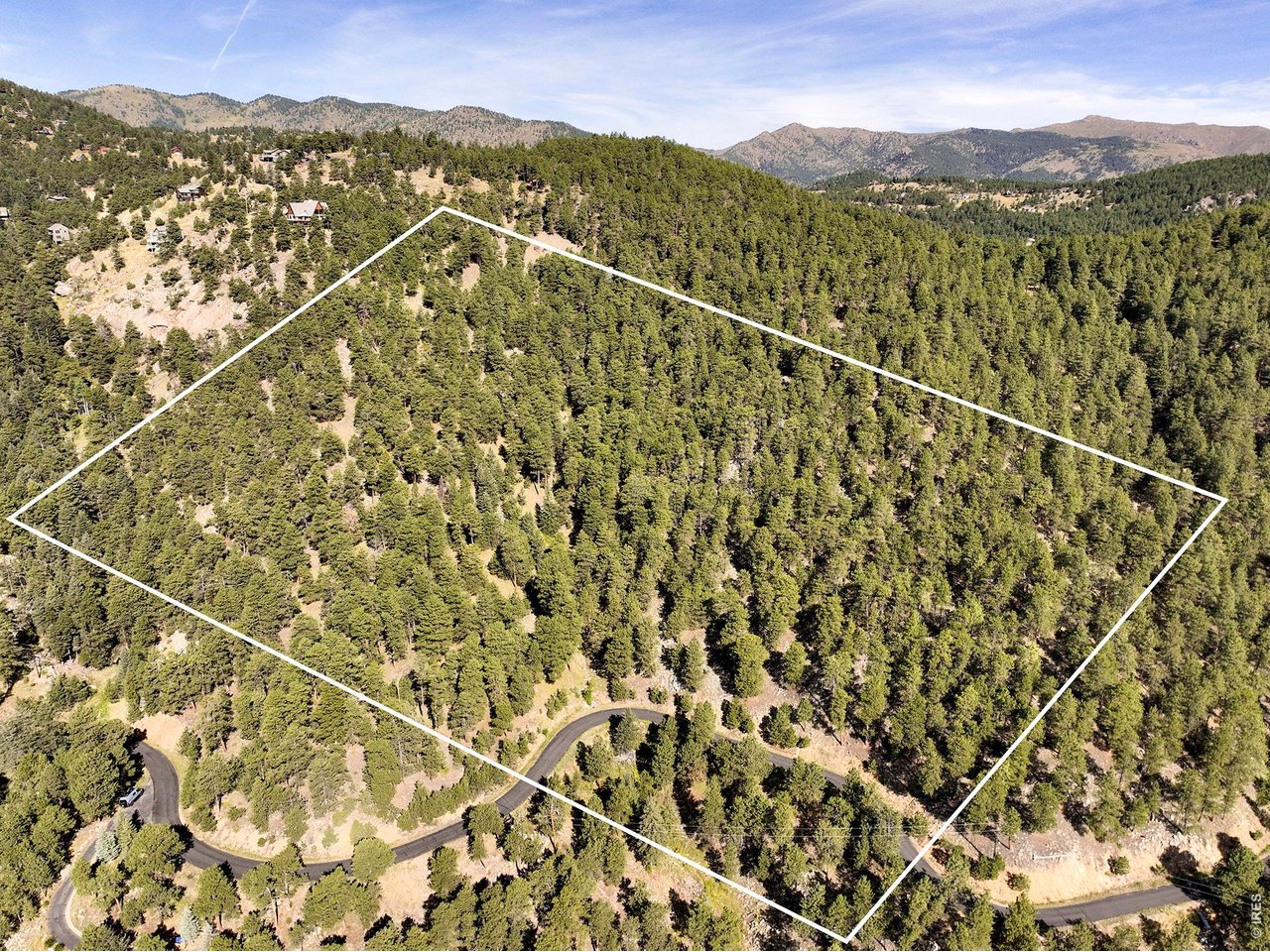 695 Cutter Lane Boulder, CO 80302 - Photo 2 of 20 a view of a city with a mountain