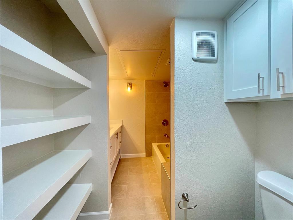 336 Melrose Drive, Unit 5C Richardson, TX 75080 - Photo 14 of 22 a view of walk in closet