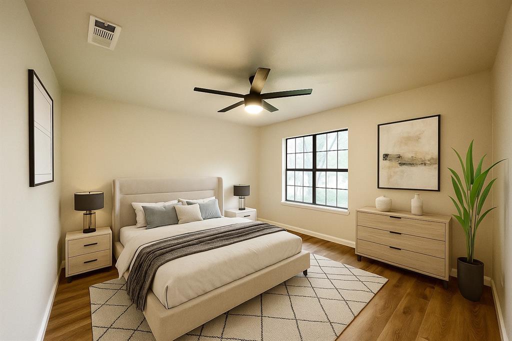 336 Melrose Drive, Unit 5C Richardson, TX 75080 - Photo 5 of 22 a bedroom with a bed and a window