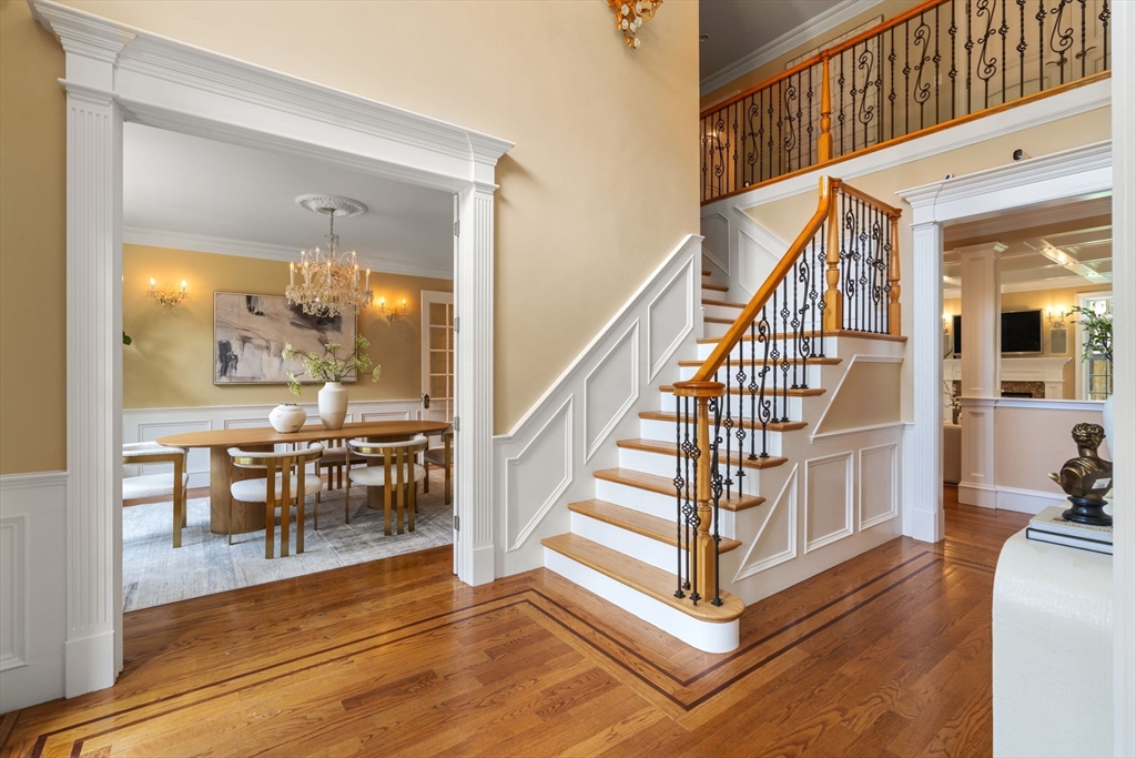 22 Scotney Road Newton, MA 02467 - Photo 7 of 42 a view of a livingroom with furniture wooden floor and windows