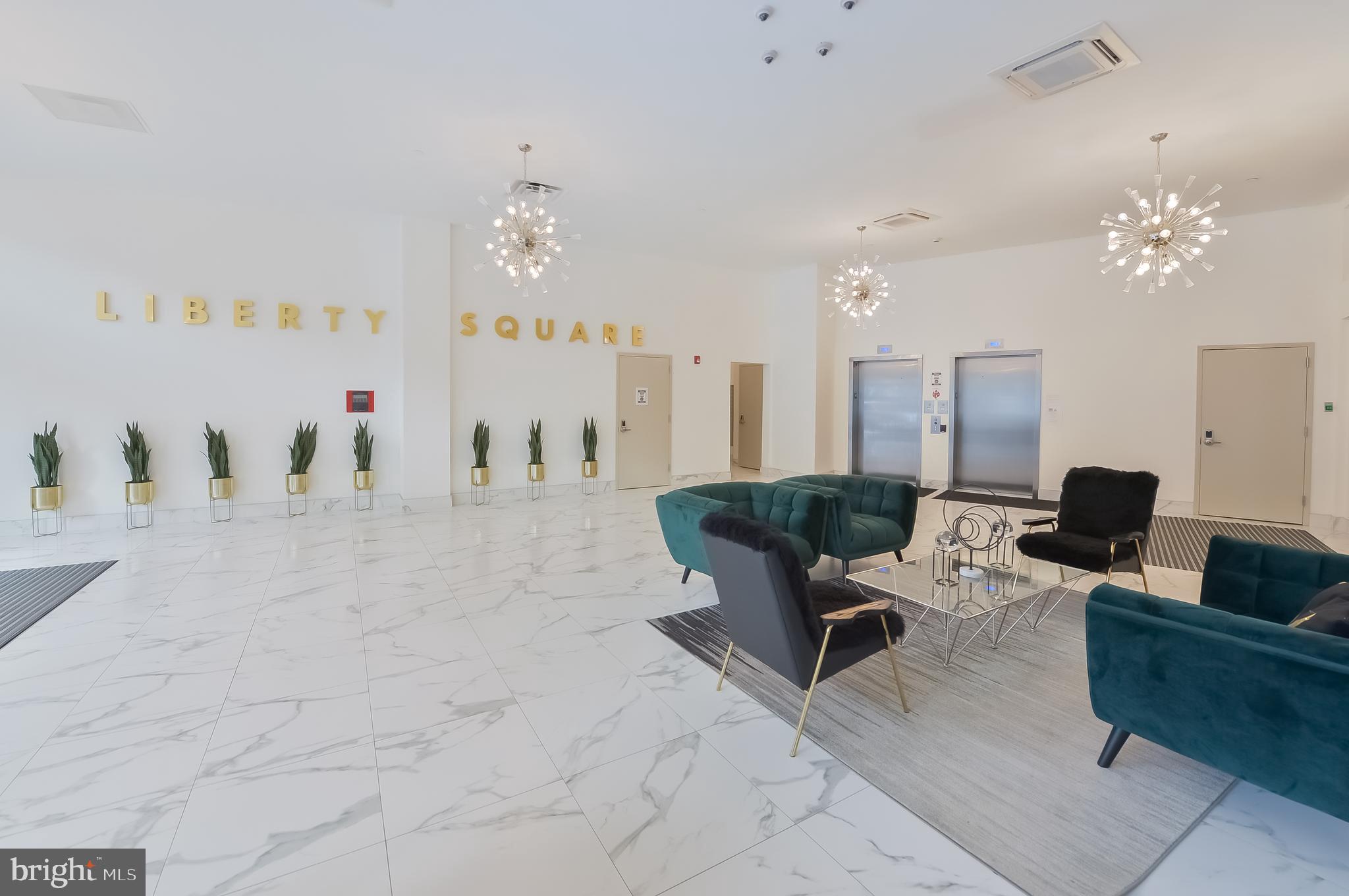 236 West Thompson Street, Unit B401 Philadelphia, PA 19122 - Photo 12 of 48 a living room with furniture