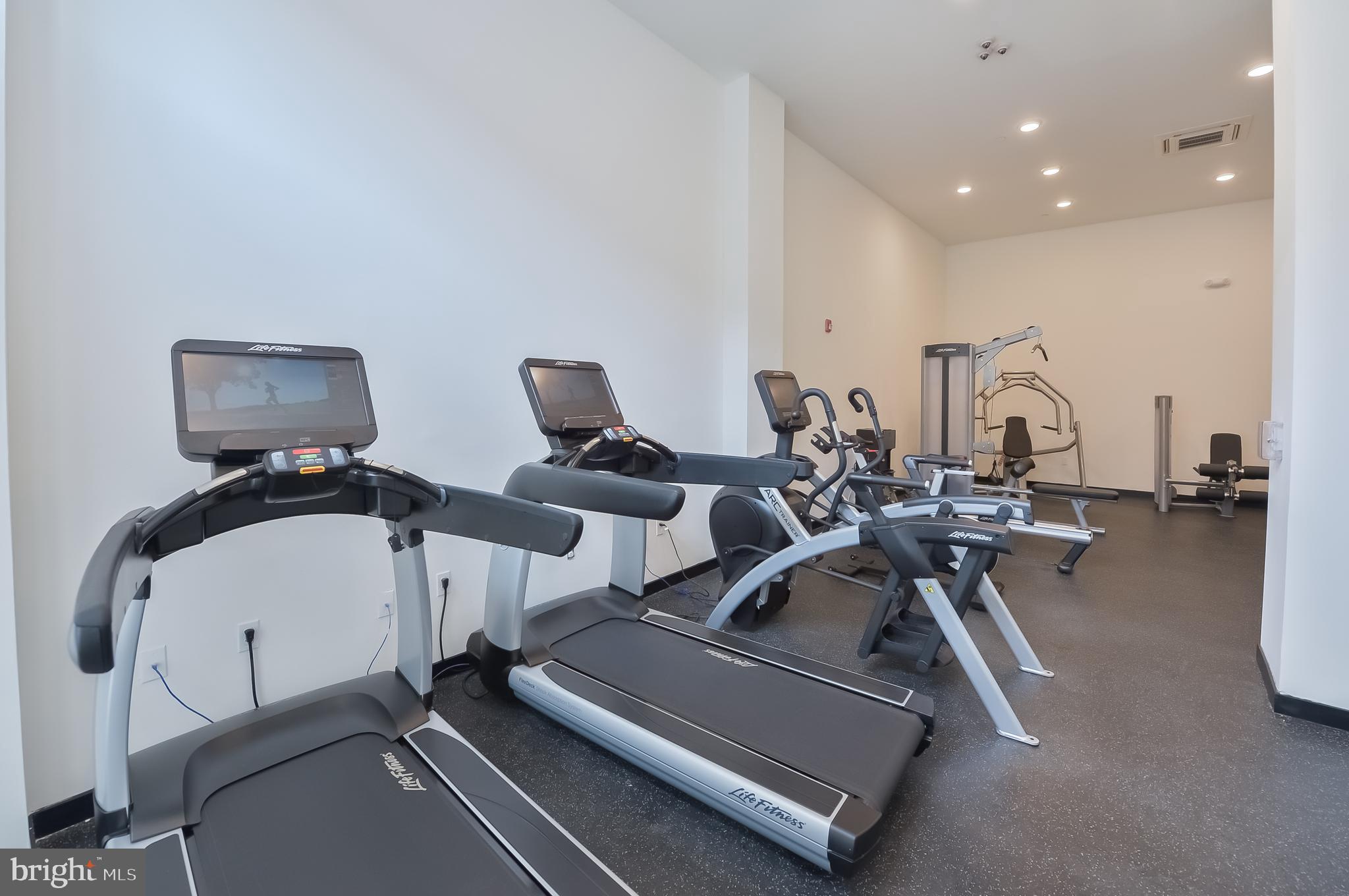 236 West Thompson Street, Unit B401 Philadelphia, PA 19122 - Photo 17 of 48 a room with gym equipment