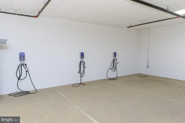 a view of a room with rack and wooden floor