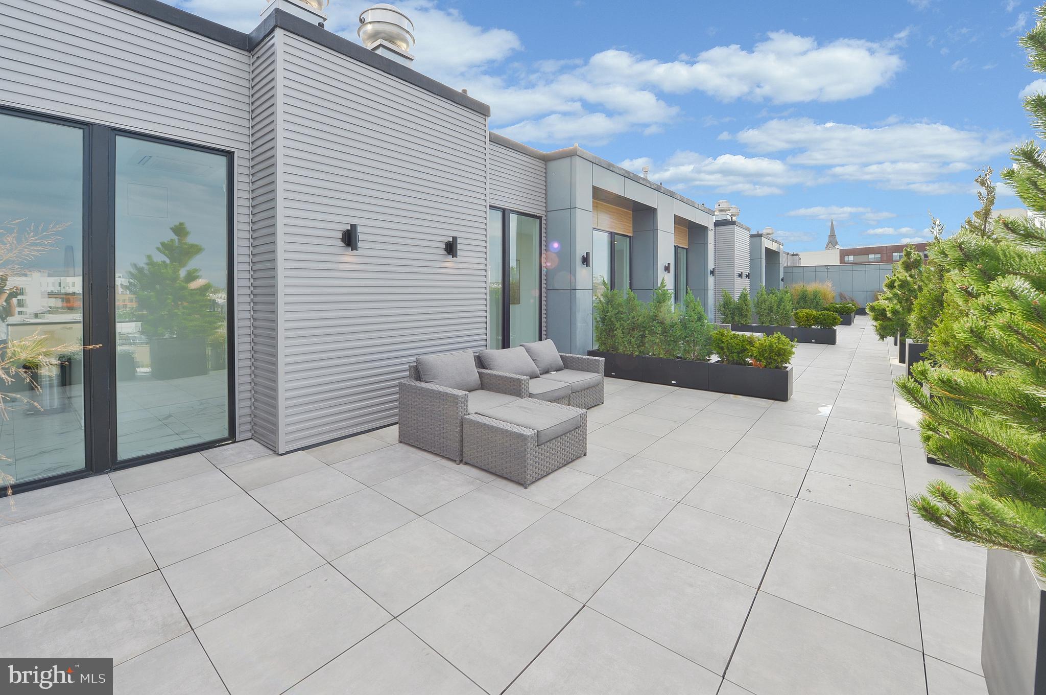 236 West Thompson Street, Unit B401 Philadelphia, PA 19122 - Photo 43 of 48 a view of a terrace with furniture