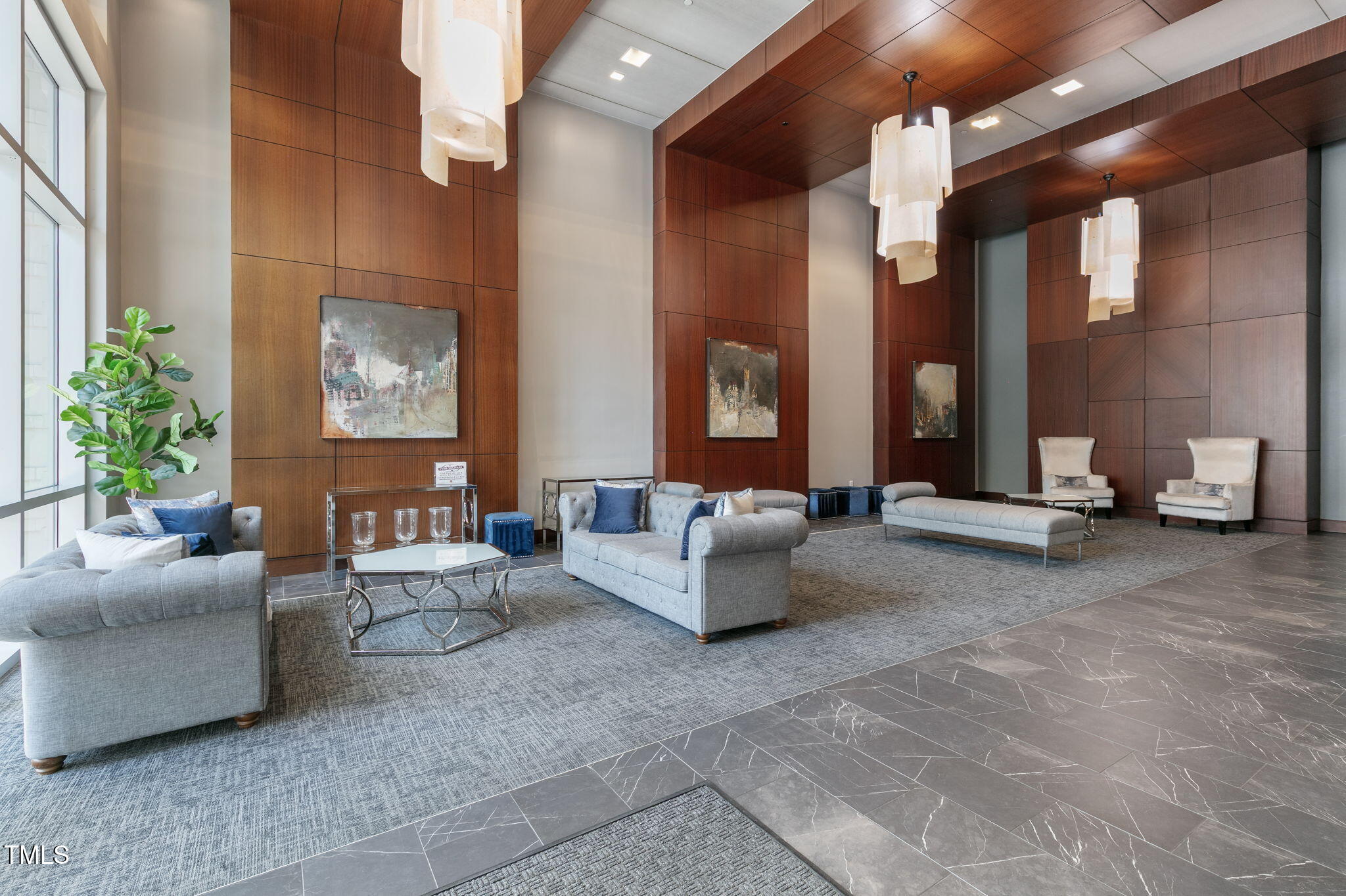 400 West North Street, Unit 1134 Raleigh, NC 27603 - Photo 26 of 39 a living room with furniture and a potted plant