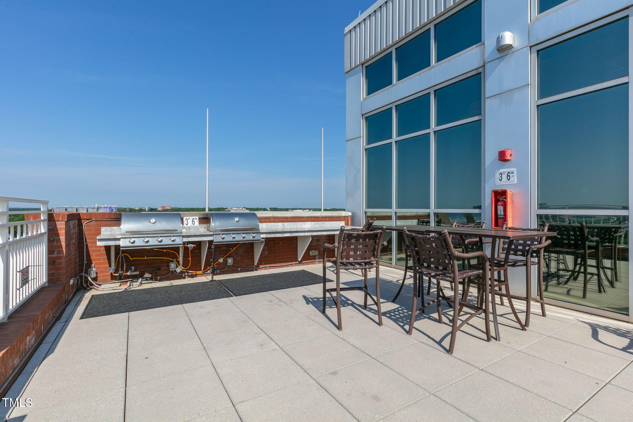 400 West North Street, Unit 1134 Raleigh, NC 27603 - Photo 29 of 39 a view of outdoor space with chairs